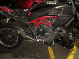 Black Ducati Diavel motorcycle with red frame